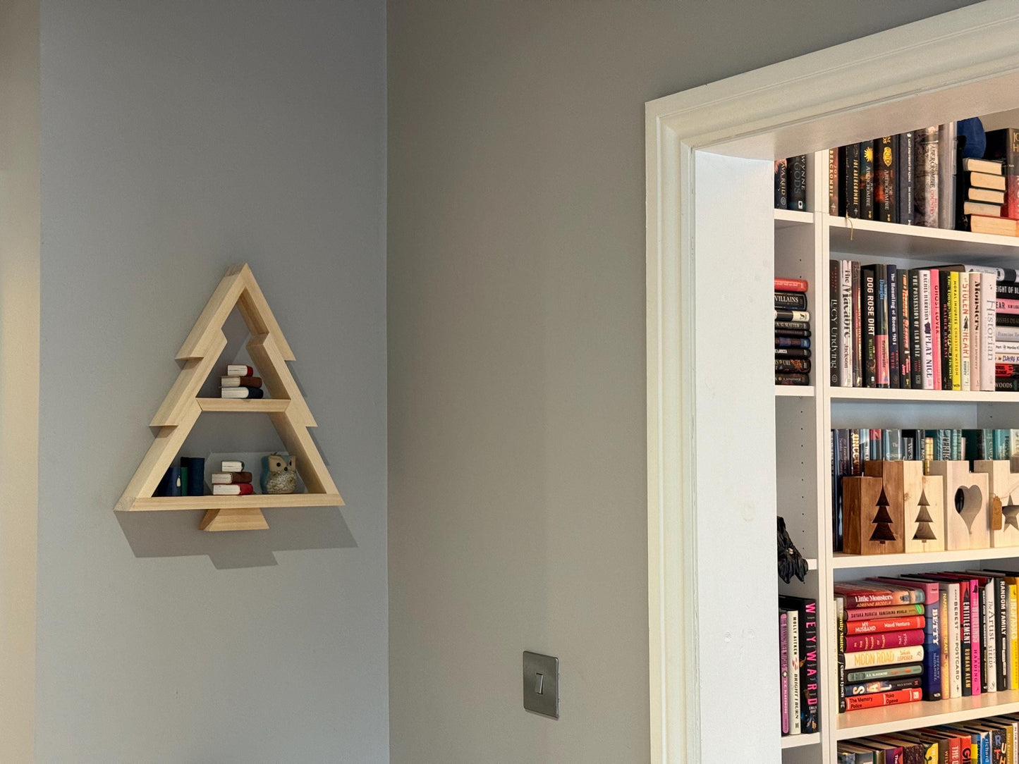 Fir tree display with removable shelf. Minimalist Christmas tree decor.